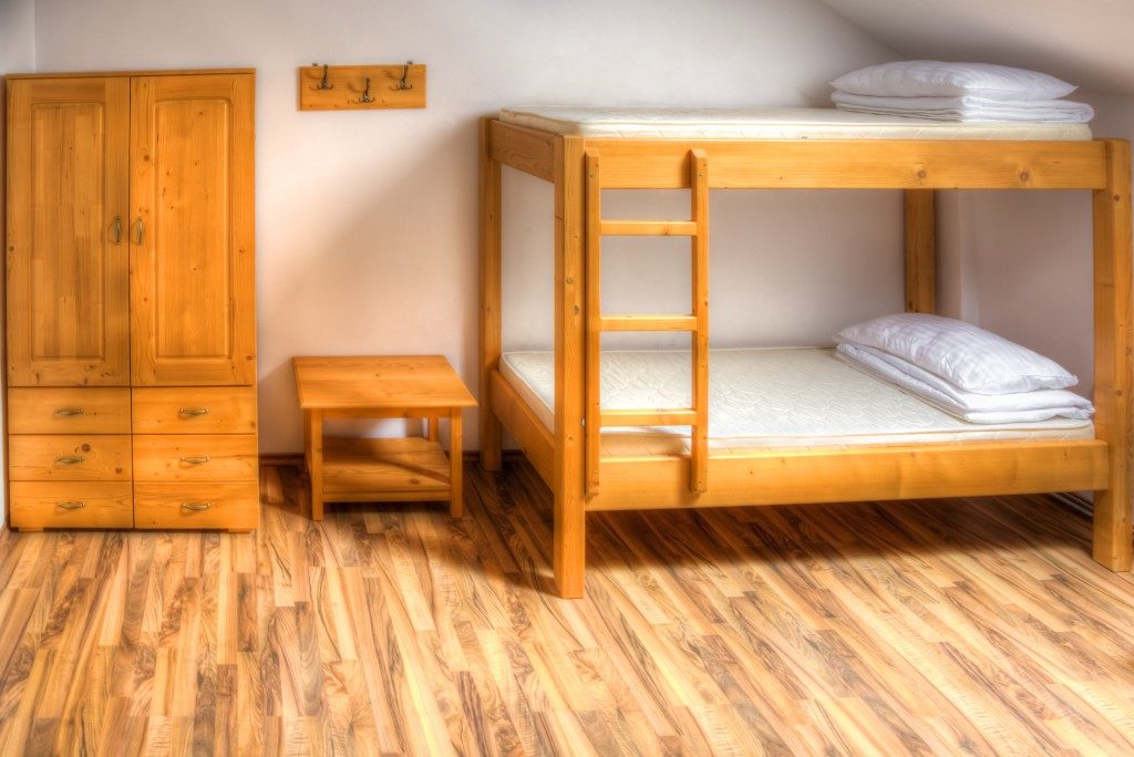 Clean hostel room with bunk bed