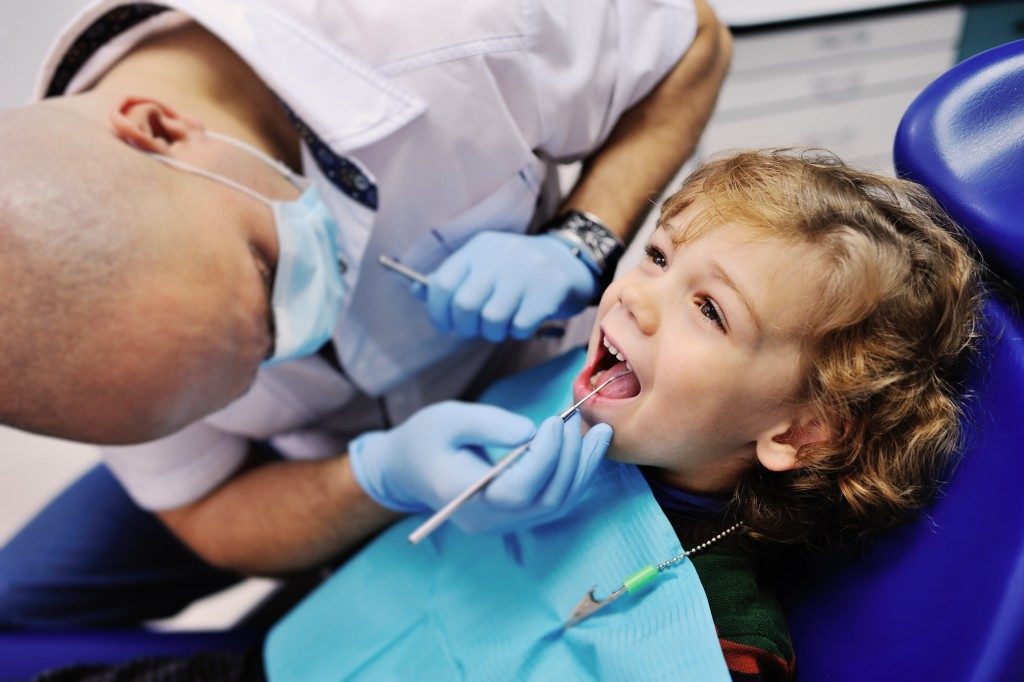 Child with a dentist