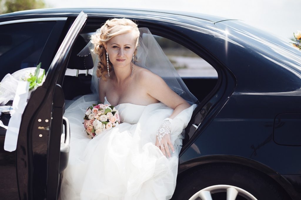 Bride getting out of the car