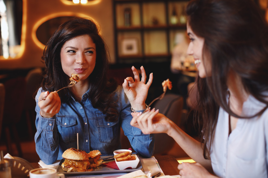 women eating at restaurant